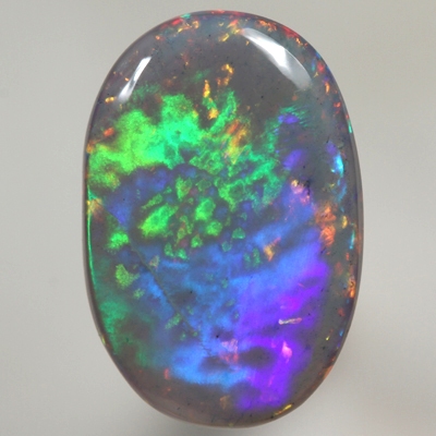 SOLID SEMI BLACK OPAL Large rolling flash of green and blue over sparkling red and orange See video